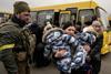 Evacuees flee the fighting around Kyiv