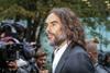Russell Brand attends trial at Southwark Crown Court