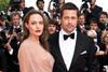 (L-R) Actress Angelina Jolie and actor Brad Pitt arrive at the premiere of "Inglorious Basterds" at the 62nd Cannes Film Festival in Cannes.