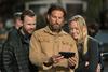 Lynette Howell Taylor (right) with director Bradley Cooper and production co-executive Weston Middleton c Universal