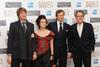 At The King's Speech gala: director Tom Hooper with stars Helena Bonham Carter, Colin Firth, and Geoffrey Rush