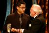 Asif Kapadia with the Carl Foreman Special Achievement Award