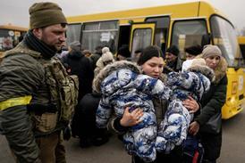 Evacuees flee the fighting around Kyiv