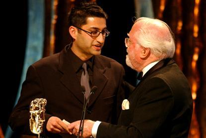Asif Kapadia with the Carl Foreman Special Achievement Award