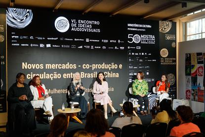 Uta Schwietzer (third from left, holding mic), Jacqueline Sato (fourth from left) and Shen Kemin (second from right) at Mostra de São Paulo's Audiovisual Ideas Market