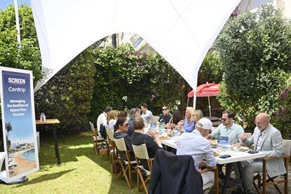 Guests cover the challenges of film financing, pictured in the Screen International garden, Cannes