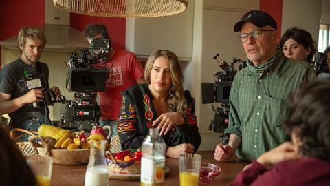 Karla Sofia Gascon with director Jacques Audiard on the set of 'Emilia Perez'