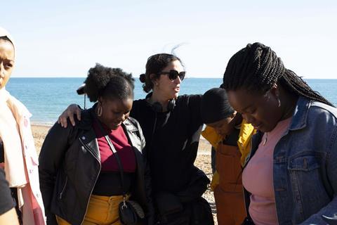 Sarah Gavron (centre) and cast on the set of 'Rocks'