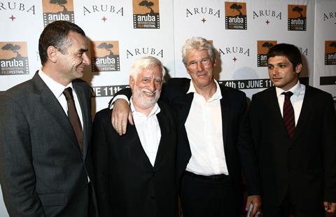 Richard Gere with festival heads at the 2010 Aruba International Film Festival.