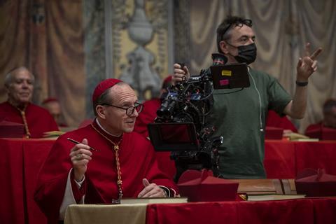 Ralph Fiennes, as Cardinal Lawrence, with cinematographer Stephane Fontaine