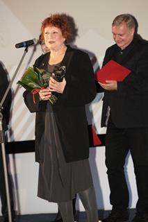 Susanne Rostock picks up the award for Sing Your Song.