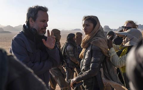 DUNE_Denis Villeneuve pictured on set with Zendaya_ Credit Chiabella James