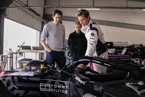 (L-R): 'F1' director and co-writer Joseph Kosinski, producer Jerry Bruckheimer, and Brad Pitt