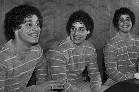 Three identical strangers