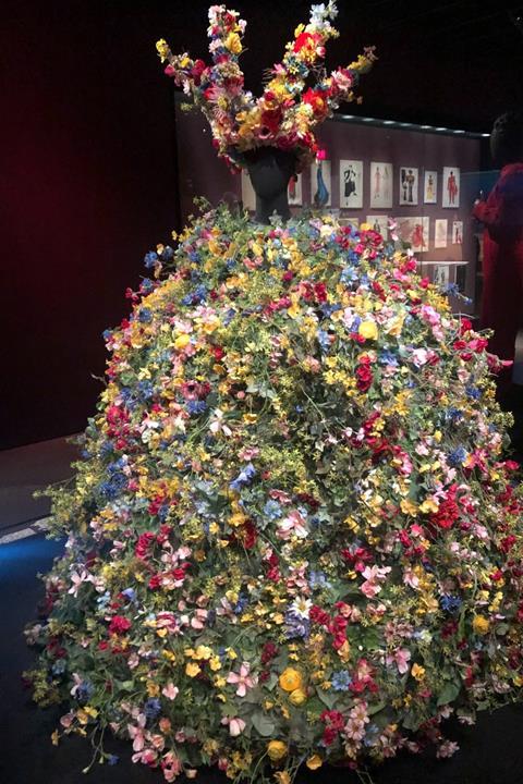 'May Queen' costume worn by Florence Pugh in Midsommar. The dress designed by Andrea Flesch features 10,000 silk flowers.