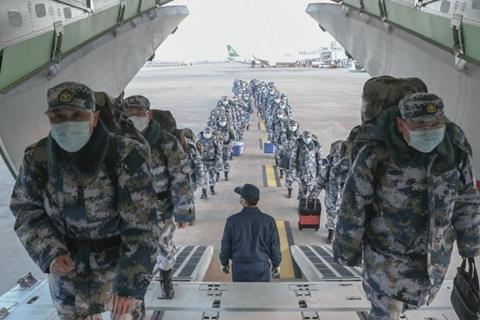 The first group of 150 Navy medics head to Wuhan 