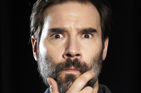 ADAM BUXTON HAND ON CHIN