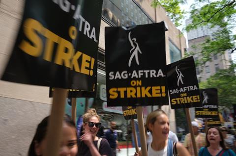 Members of SAG-AFTRA picket outside of NBC Universal at Rockefeller Center on second day of strike.