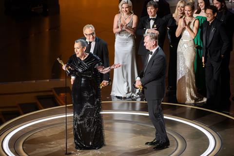 (L-R): Emma Thomas, Charles Roven and Christopher Nolan accept the best picture Oscar for 'Oppenheimer'.