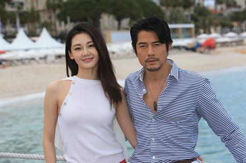 Aaron Kwok and Miao Miao