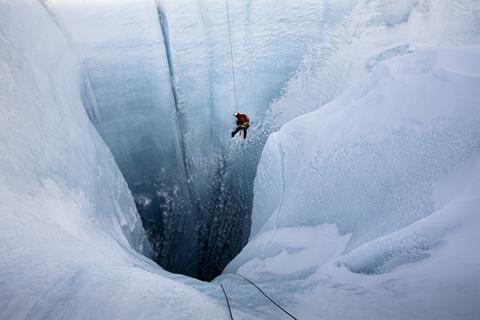 Alun Hubbard descending into the Moulin hole_credit Lars H. Ostenfeld