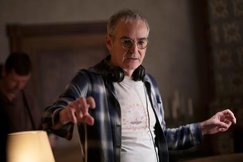 Olivier Assayas on the set of 'The Wizard of the Kremlin'