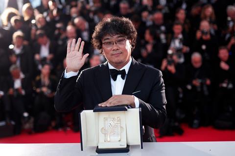 Bong Joon-ho poses with his Palme d'Or 