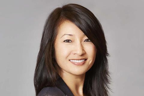 Helen Lee-Kim, Lionsgate International’s international head, signs a long-term contract
