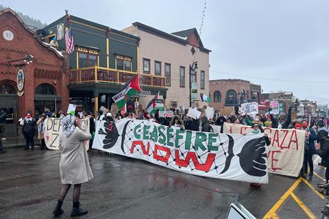 Protestors at the 'Let Gaza Live' rally march along Main Street, Park City, on Sunday.