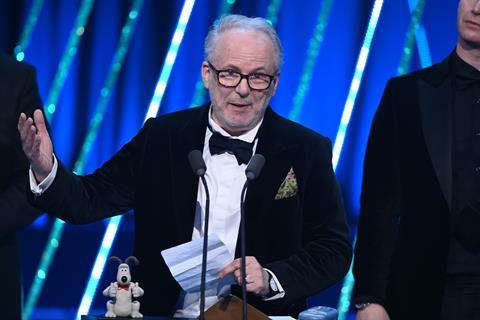 Nick Park accepts the Children's & Family Film Award for 'Wallace and Gromit: Vengeance Most Fowl'