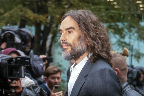 Russell Brand attends trial at Southwark Crown Court