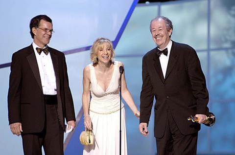 Daniel Louis, Denise Ryan and Denys Arcand accepting the Academy Award for Best Foreign Film for 'The Barbarian Invasions'