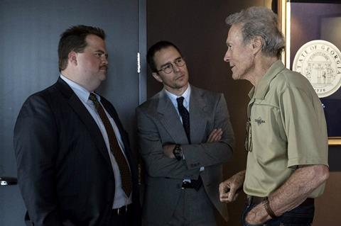 (L-R) PAUL WALTER HAUSER SAM ROCKWELL and CLINT EASTWOOD on the set of Warner Bros