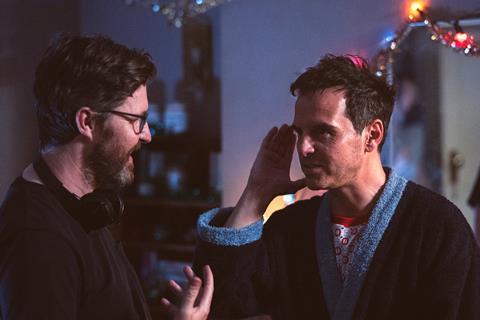 Andrew Haigh and Andrew Scott on the set of ALL OF US STRANGERS. Photo by Chris Harris. Courtesy of Searchlight Pictures