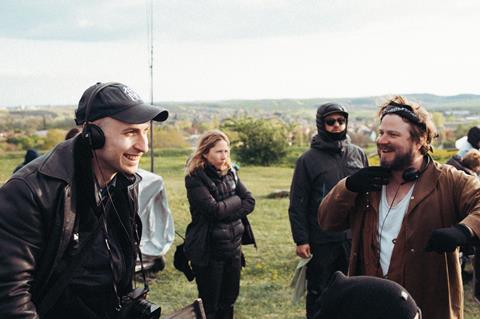Daniel Blumberg and Brady Corbet on the set of 'The Brutalist'