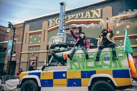 Arriving in Park City in a replica of a Police Service of Northern Ireland Land Rover