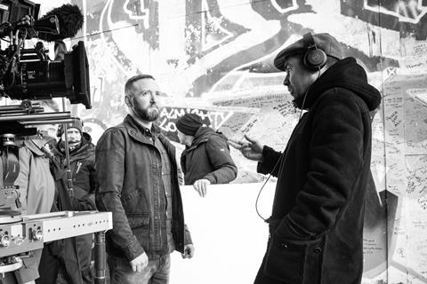 JJ O Dochartaigh and director Rich Peppiatt on the set of Kneecap