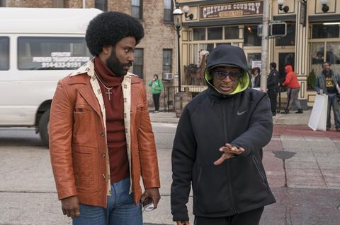 Spike Lee with actor John David Washington on the set of BlacKkKlansman c David Lee