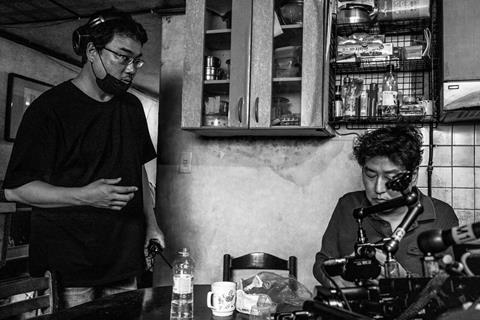 BONG JOON HO & SONG KANG HO on the set of PARASITE_credit Neon 