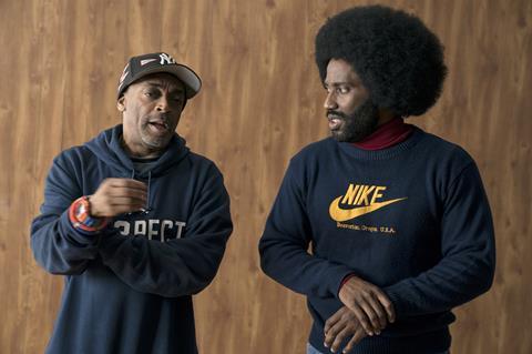 (From left) Director Spike Lee John David Washington (who plays Ron Stallworth) on the set of BlacKkKlansman