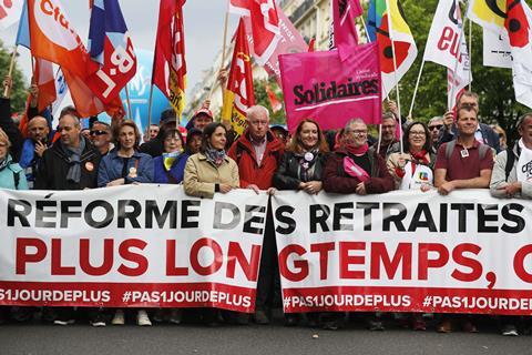 Principal French trade union leaders carry a banner reading Pension reform_Credit CHRISTOPHE PETIT TESSON-EPA-EFE-Shutterstock