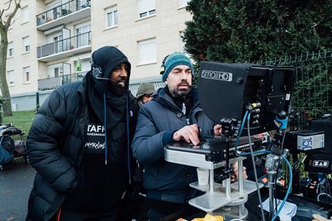 Ladj Ly and DOP Julien Poupard on the set of 'Les Indesirables'
