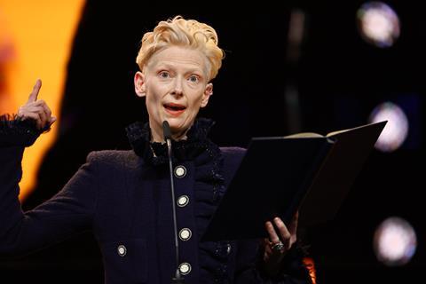 Tilda Swinton speaks after receiving her Honorary Golden Bear award onstage during the opening ceremony of the 75th Berlin International Film Festival