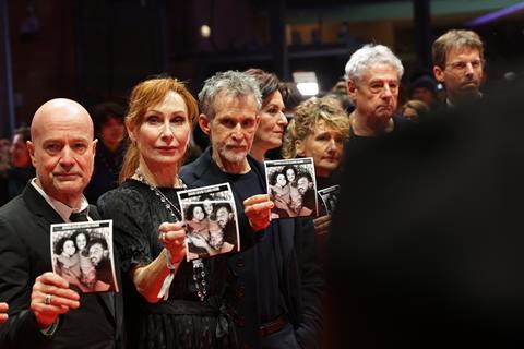 Christian Berkel, Andrea Sawatzki, and Ulrich Matthes pose with other guests as they arrive for the opening ceremony of the 75th Berlin International Film Festival, in Berlin, Germany, 13 February 2025. The Berlinale will run from 13 to 23 February 2025.