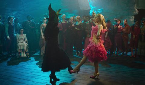 Elphaba dances in the Ozdust Ballroom in 'Wicked'